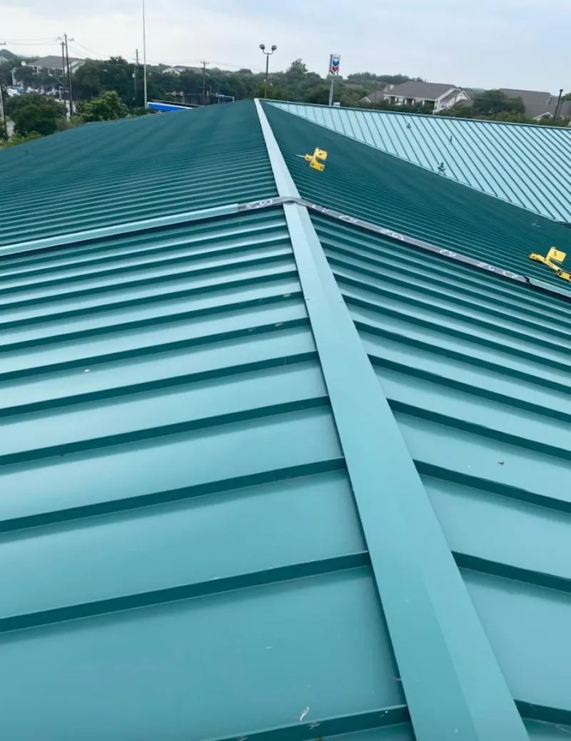 Green commercial metal roof ridge and valley for Metal Roof Repair in Brewster