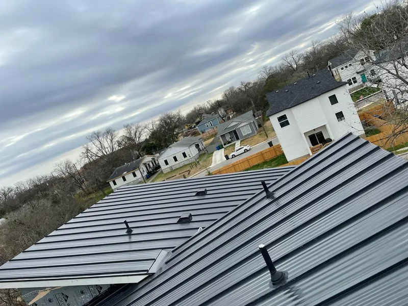 Standing seam metal roof panels with vents for Skylight Repair in Brewster